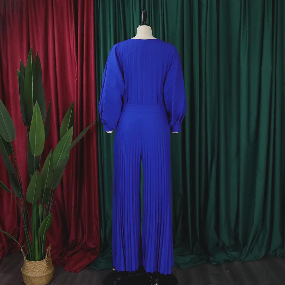 Europäischer und amerikanischer Sommer-Zweiteiler für Damen mit lockerer Passform: Freizeithemd und Hose mit weitem Bein.