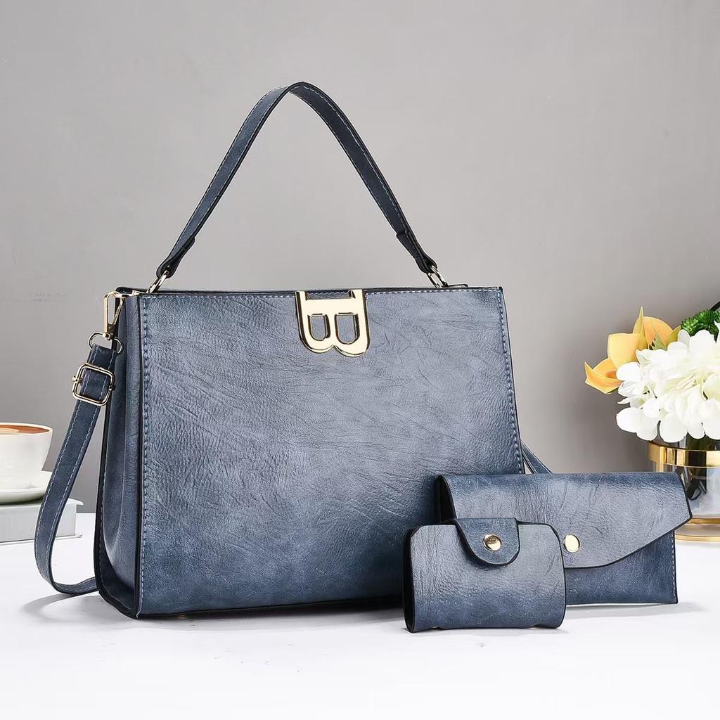 New retro pattern simple solid color large capacity shoulder portable three-piece set texture women's bag big bag