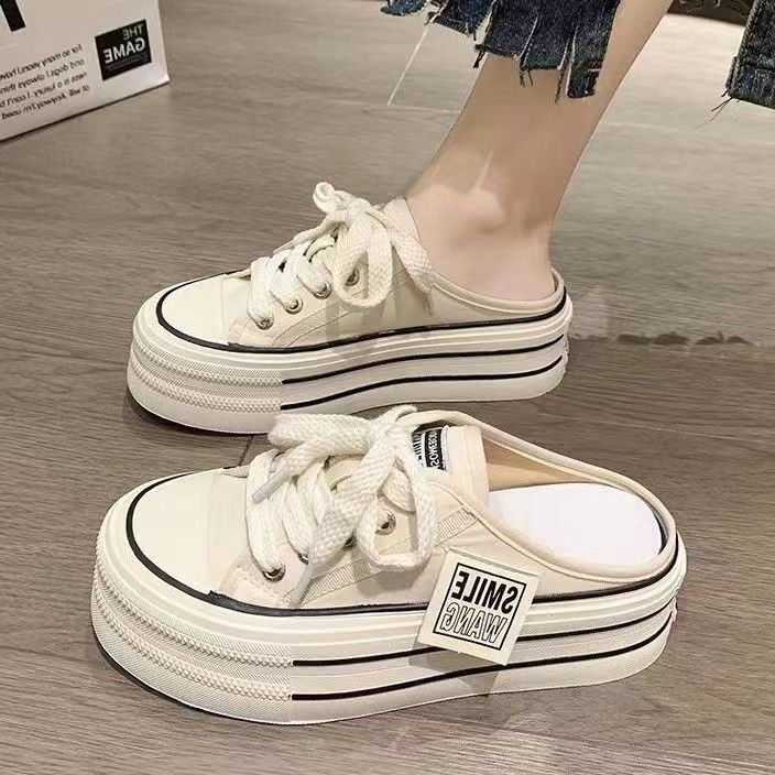 

Canvas half slippers women s summer wear 2025 new Internet celebrity explosion high sense thick bottom height no heel lazy 40