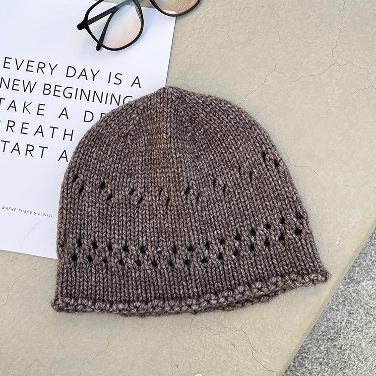 The New Woolen Pullover Hat Is Feminine  Warm and Ear Protecting. The Woolen Knitted Hat Makes The Face Look Smaller and Is A Retro Cold Hat