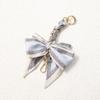 Elegant Hand-Woven Scarf Chain with Bow Decoration Pendant for Bag Strap Modification.