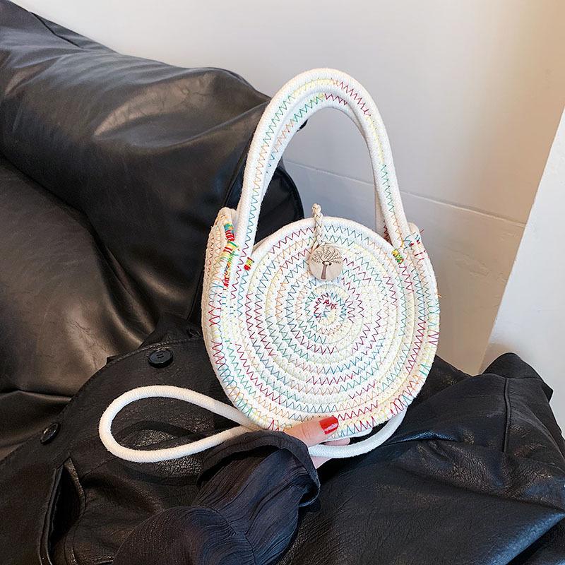 

2024 summer new striped woven bag women s ethnic style casual simple beach bag exotic style portable messenger bag білий