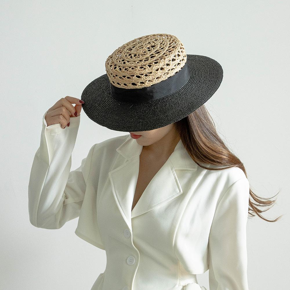 Spring and summer new fashion casual webbing bow hand-woven hollow splicing raffia flat top hat sunshade straw hat tide