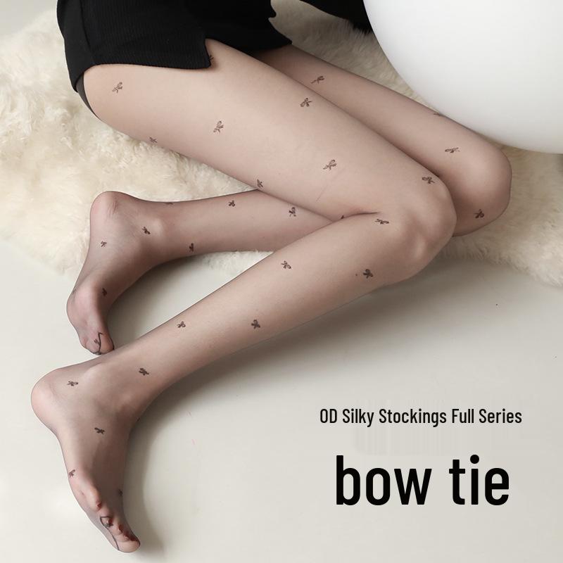 Ultra-Thin Black Polka Dot Stockings for Women - Snag-Resistant, Highly Transparent, Spring/Summer Style, Bare Leg Feel.