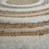 Tapis rond aspect jute motifs en relief blanc diamètre 70