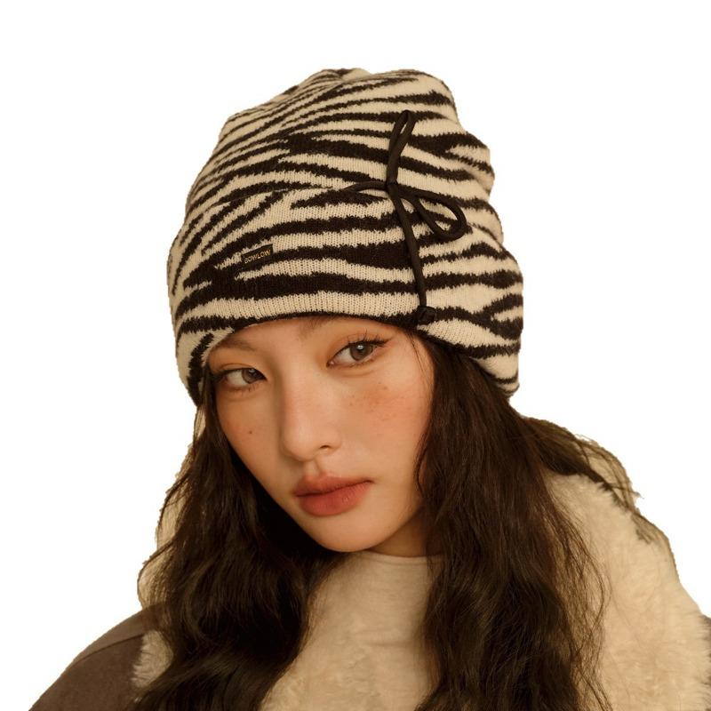 Zebra pattern versatile wool knitted hat autumn and winter hat women's warm ear protection cold hat showing face small pile hat