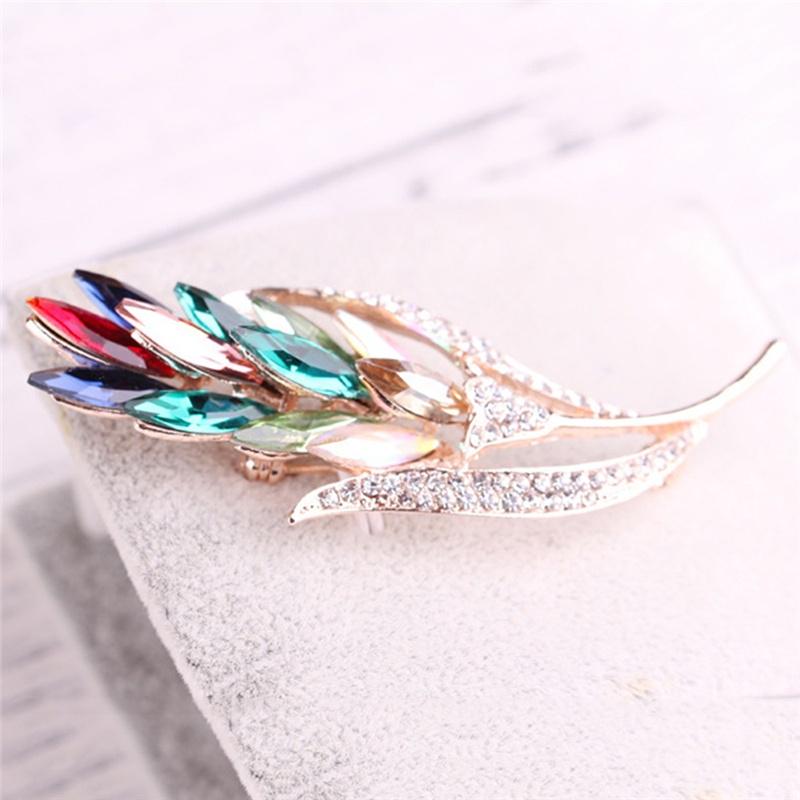 Schumacher Broche veelkleurig elegant Sieraden Broches Schumacher Broche veelkleurig elegant Sieraden Broches