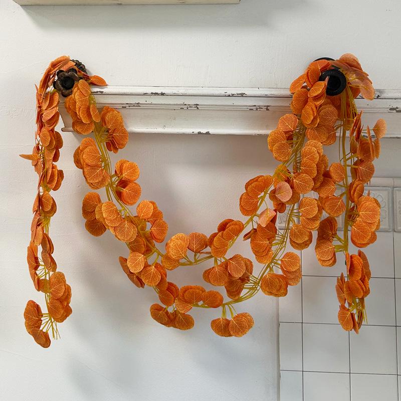 

Искусственные листья и лозы эвкалипта для украшения дома Зеленые растения Искусственные листья и лозы Свадебный декор Реквизит A pack of 12 pieces оранжевый
