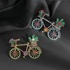 Vintage Rhinestone Bicycle Brooch: High-End European & American Retro Pin with Anti-Exposure Design