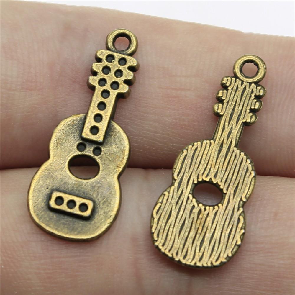 10 sztuk zawieszek muzycznych Instrumenty muzyczne Gitara Bęben Fortepian Mikrofon Zawieszki do tworzenia biżuterii
