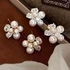 Romantic Zirconia Petal Pearl Stud Earrings: Unique, Beautiful, Light Luxury Flower Design for New Year.