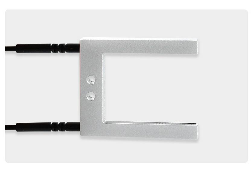 U-groove Through-beam Fiber Optic Sensor for Label Positioning with U-shaped Grating Probe