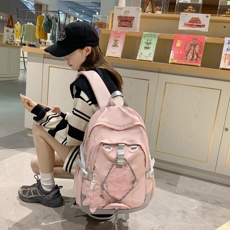 

School bag female high school college student large capacity backpack trend versatile junior high school student backpack рожевий