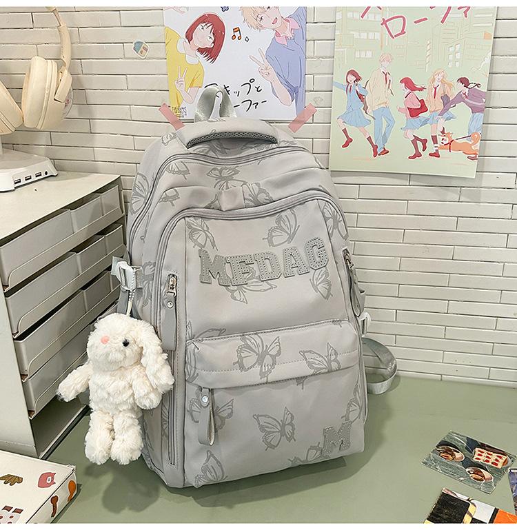 Schoolbag Soft light Cool atmosphere Milk white butterfly full print schoolbag Junior high school students Daily commute Lightweight versatile