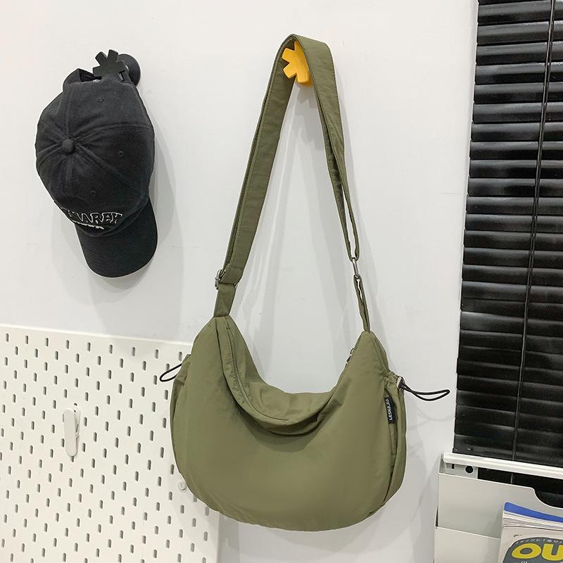 

Сумка женская большой вместимости 2025 новая однотонная повседневная на плечо, сумка-мессенджер, для учебы, нишевый дизайн, сумка-пельмень зелёный