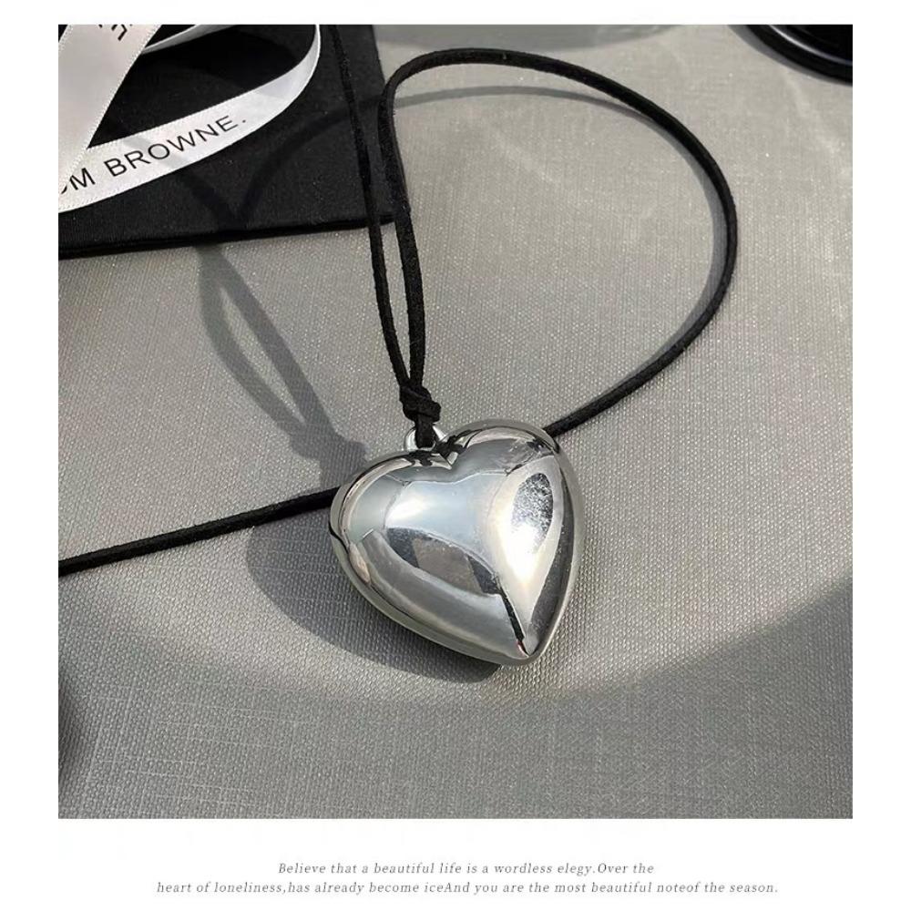 Adjustable Choker Necklace with Large Heart Pendant Elegant Black Cord Design for Women