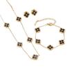 European Three-Piece Jewelry Set: Retro Black Gold Four-Leaf Clover Necklace, Earrings, and Bracelet