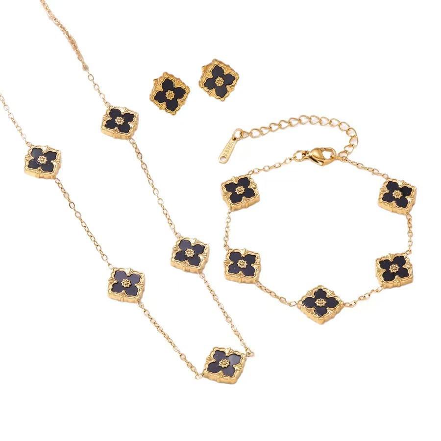 European Three-Piece Jewelry Set: Retro Black Gold Four-Leaf Clover Necklace, Earrings, and Bracelet