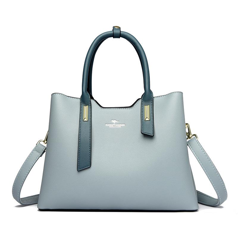 This Fashionable Color-blocking Bag Is Simple Elegant and Stylish for Ladies. It's A Hand-held Shoulder Bag