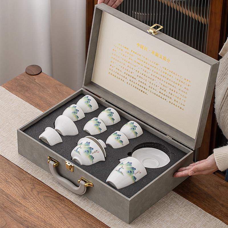 Suet Jade Tea Set Will Give Customers Ceramic Cover Bowls, Teacups, Gift Boxes, and Business Gifts.