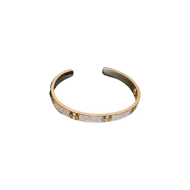 Zircon Metal 'H' Style Bracelet: Elegant, Versatile, and Fashion-forward Jewelry for Women.