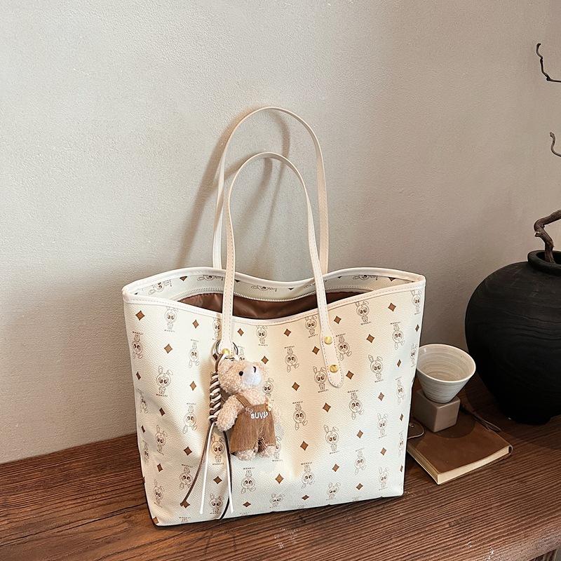 Frühlings- und Sommer-Großraumtasche 2025 neue Damenhandtasche Mode Pendler Retro Umhängetasche Studentin Unterricht Tragetasche