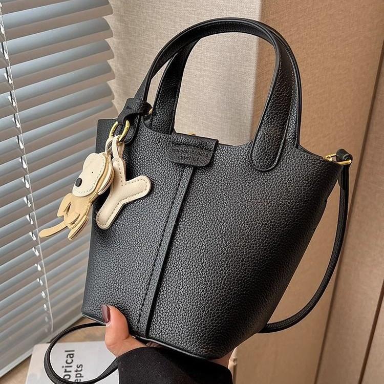 Premium sense bag women's 2025 spring new fashion work handbag solid color texture versatile messenger bucket bag