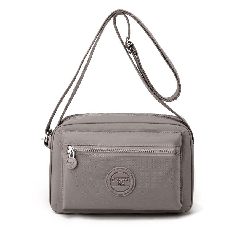 New Macaron shoulder bag women's fashion trend messenger bag multi-layer mobile phone bag