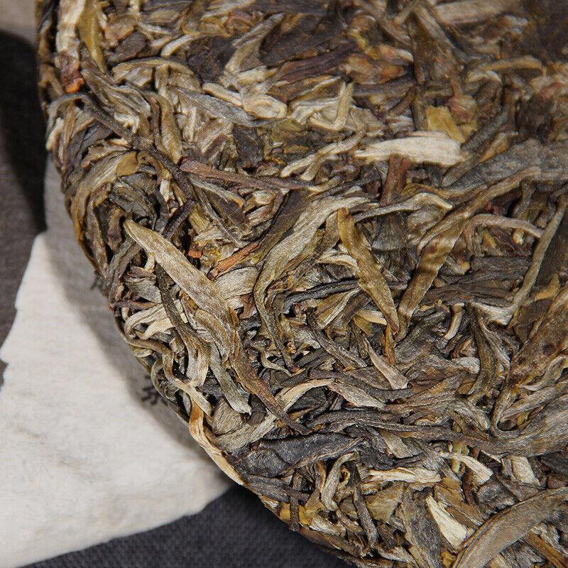 Yunnan Pu'er Tee Liangpin Serie 2017 Haiwan Alter Kamerad Liangyuan Rohkuchen 400g