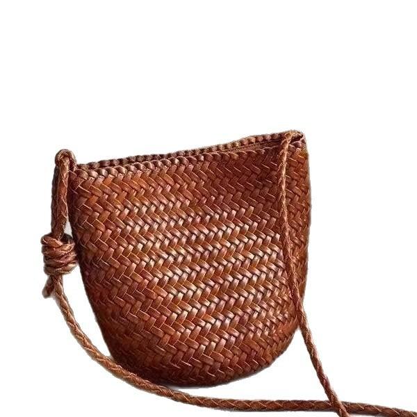Niche woven bucket bag women's new versatile commuter leather large-capacity bag shoulder messenger bag