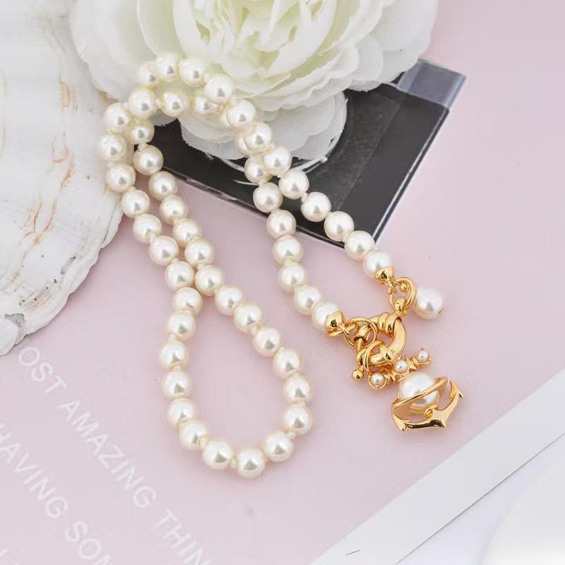 Empress Dowager Saturn Pearl Necklace, Bracelet, and Earrings Set: Light Luxury Punk Clavicle Chain for Women