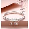 Elegant Layered Sterling Silver Bangles with Bells – Three Lives, Three Worlds Design