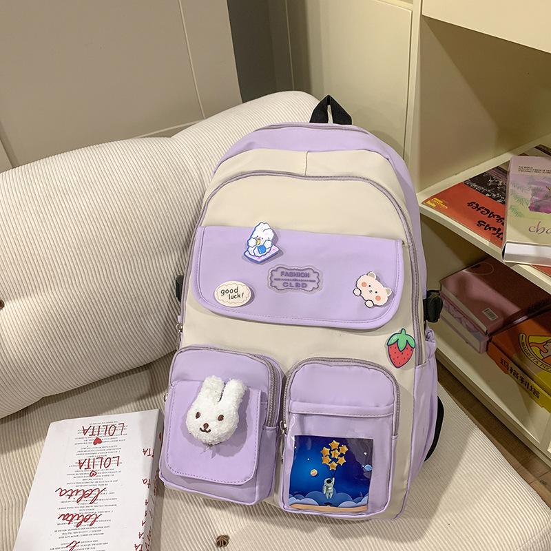 Spring new badge small fresh student schoolbag Korean version casual large-capacity campus backpack