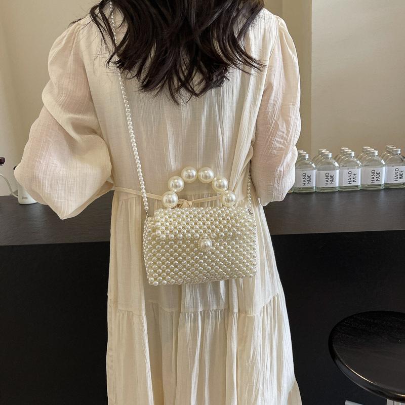 Borsa a tracolla piccola in perle tessuta a mano alla moda versatile mini borsa quadrata squisita portatile con catena di perle borsa da donna