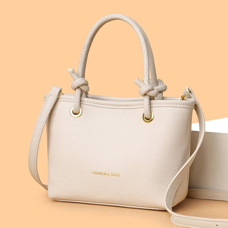 Simple Metal Air Eye Commuter Lightweight Niche Handbag