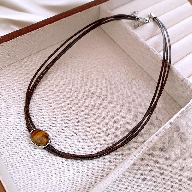 

Titanium Steel Pearl & Tiger Eye Vintage Clavicle Necklace - Light Luxury Niche Design