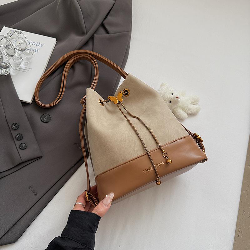 Bucket bag One shoulder messenger bag Women's autumn new niche women's bag Drawstring dual-purpose small backpack