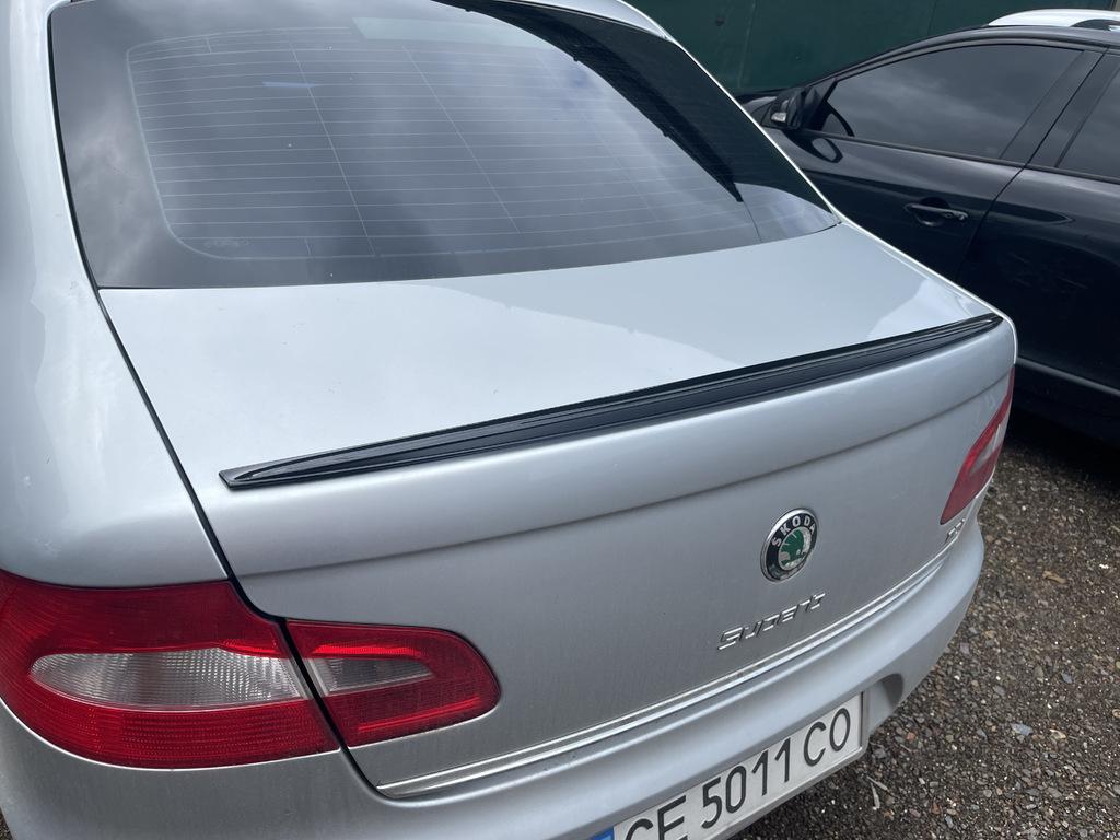 

Спойлер LIP (Sunplex, чорний) (115,8см*6,3см) для Skoda Superb 2009-2015 рр.