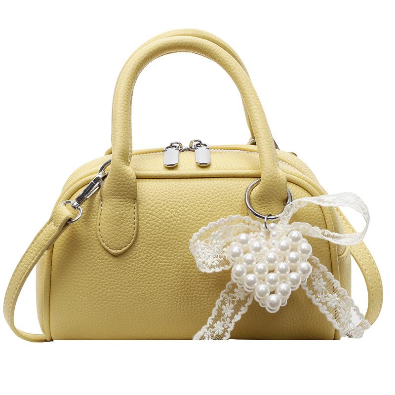 Korean Version of Simple and Gentle Wind Super Fire Solid Color Portable Bowling Bag Women's Versatile Fashion Temperament Commuter Messenger Bag