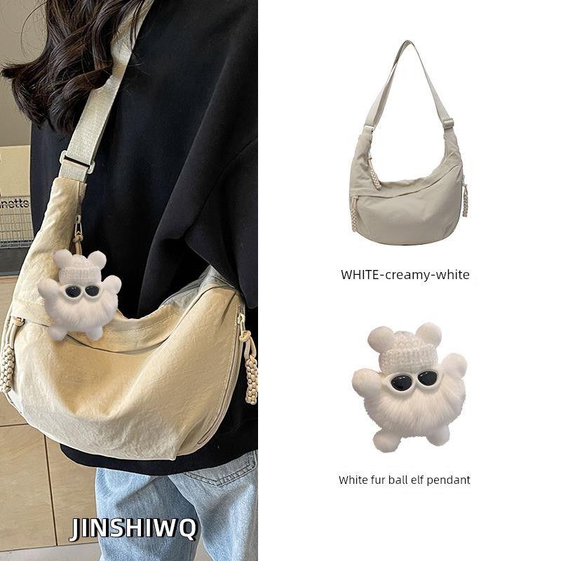 

Non-Printed Japanese Import Dumpling Bag Crossbody Bag 2025 New Bags Casual Sports Large Capacity Shoulder Commuter Bag Creamy-white + White Fur Ball Elf