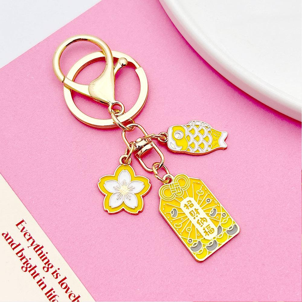 Japanese Sakura Koi Omamori Amulet Keychain for Luck, Wealth & Safety - Charming Couple's Accessory