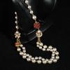 of Vintage Long and Unique Sweater Chain Design with a Court-style Glazed Pearl Necklace