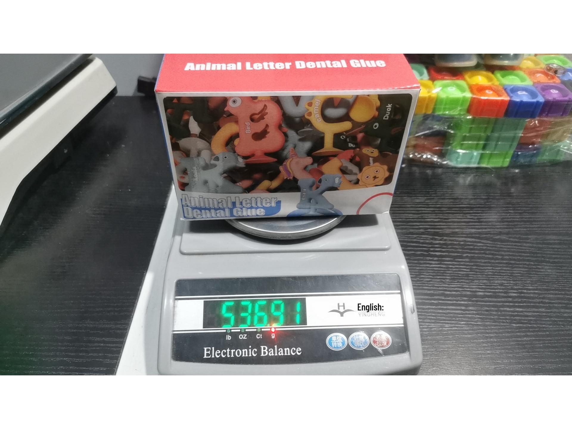 

Детская силиконовая игрушка-прорезыватель в виде алфавита с присосками