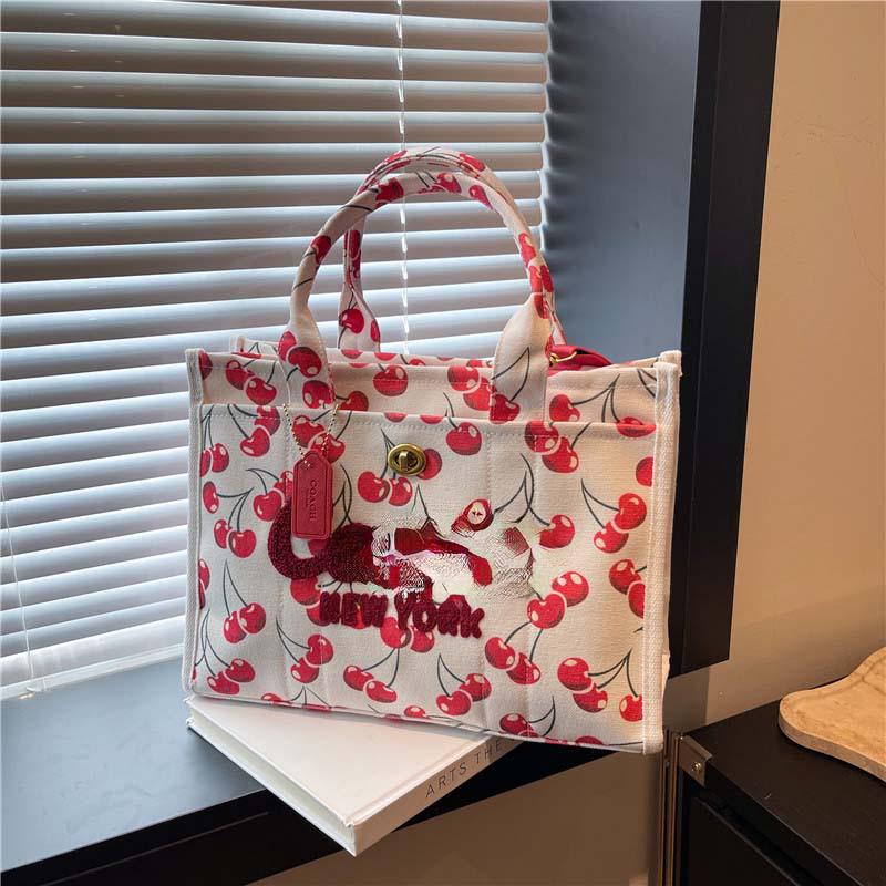 2025 Hot-Selling Large Capacity Canvas Tote: Stylish Commuter & Crossbody Bag.