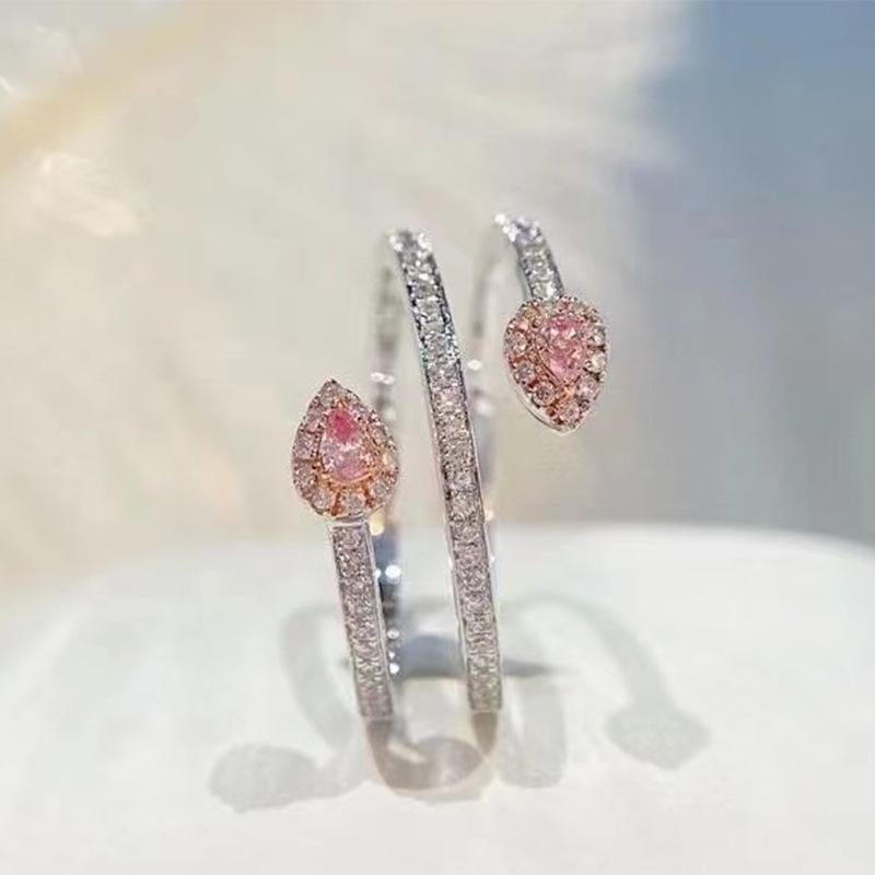 

Ювелирные изделия храма Луоси: Кольцо-обвитие змеи с розовыми бриллиантами из серебра 925 пробы, 2023. Size 7 розовый