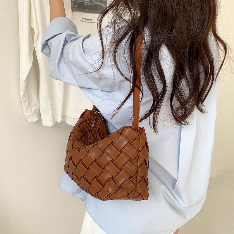 Korean casual pu leather handheld woven bag daily work commute shoulder bag tote bag feeling armpit bag women