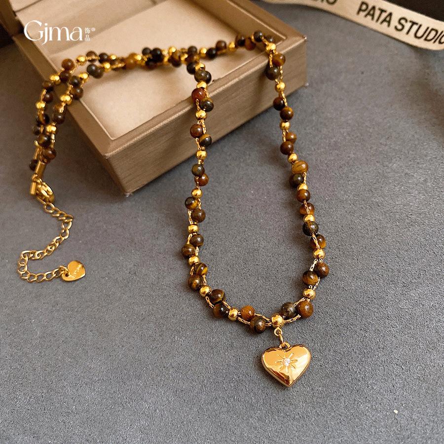 Collana con perle in occhio di tigre placcato oro 18 carati, catena per clavicola di lusso leggero, collana versatile retrò per donna