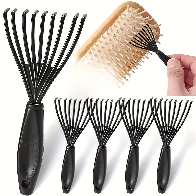 A Single Pack of Plastic Mini Comb Cleaner with Embedded Bristles a Hair Removal Tool for Home Use Featuring a Handle