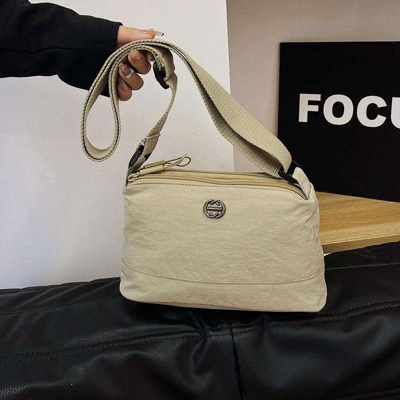 Korean version of simple trend multi-layer nylon women's bag casual fashion versatile shoulder messenger bag large capacity dumpling bag