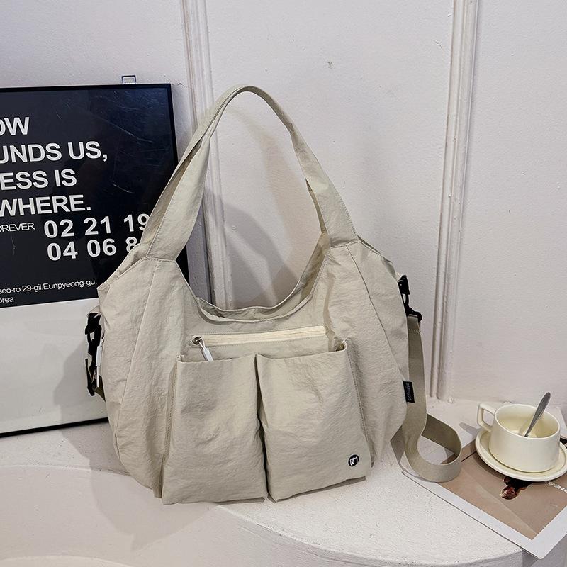 Tote bag Large capacity short trip bag Outdoor sports handbag Women's light commuter casual versatile oblique span bag